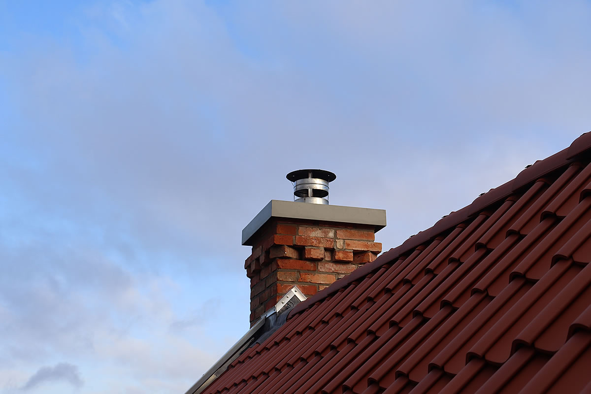 Schornstein mit Detailkette - Englische Cottages aus Celle - Bauunternehmen Alan Berry